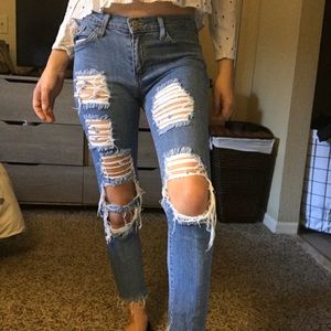 Low waisted distressed denim jeans